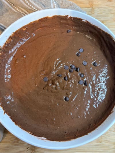 Bowl of chocolate batter with chocolate chips