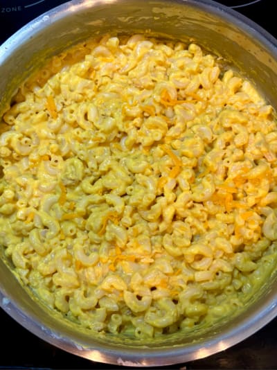 Creamy macaroni and cheese in cooking pot